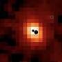Three supermassive black holes discovered in a single galaxy for the first time