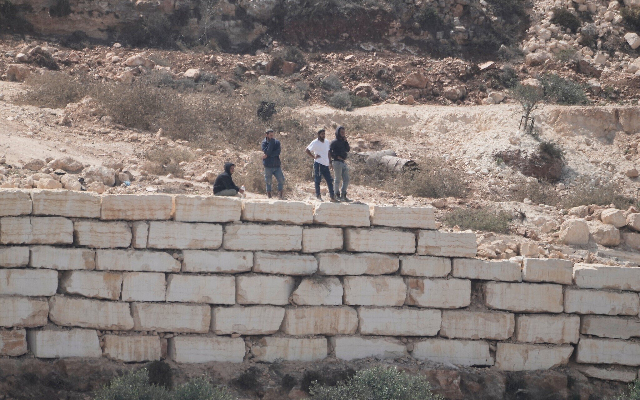 Settlers attack West Bank’s Qusra, take over home with Palestinian family inside