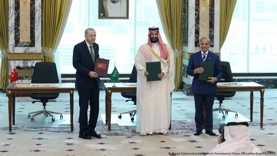 Which country is the new Mecca defense pact targeting?