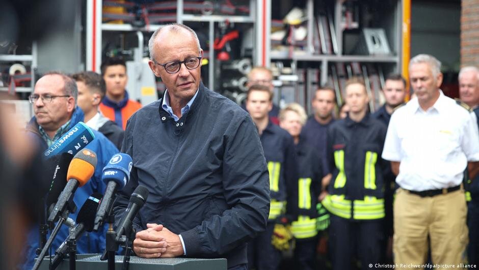 Germany news: Friedrich Merz visits area struck by fires