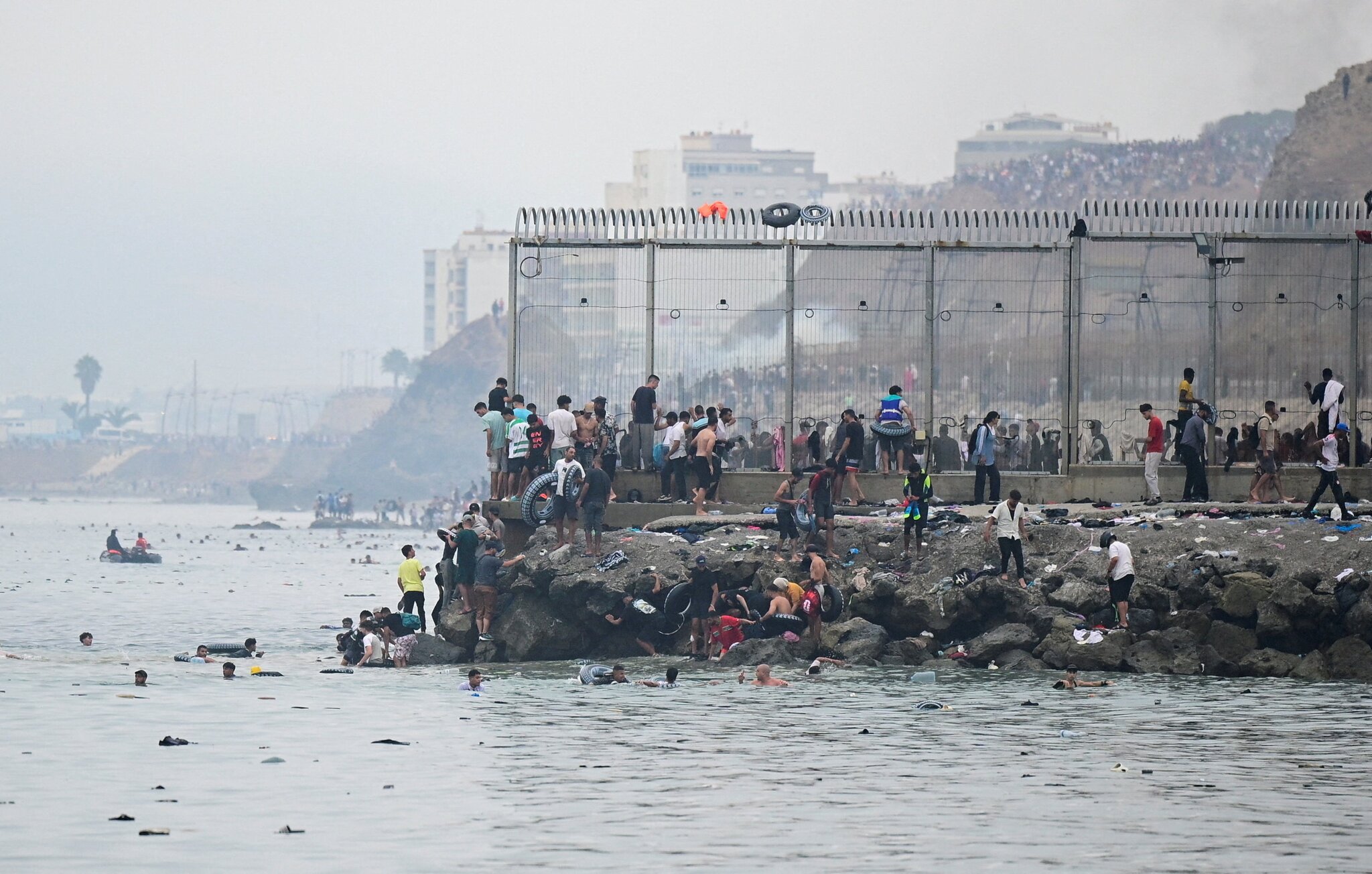 Spain PM to visit Ceuta after 19 migrants die breaching border from Morocco