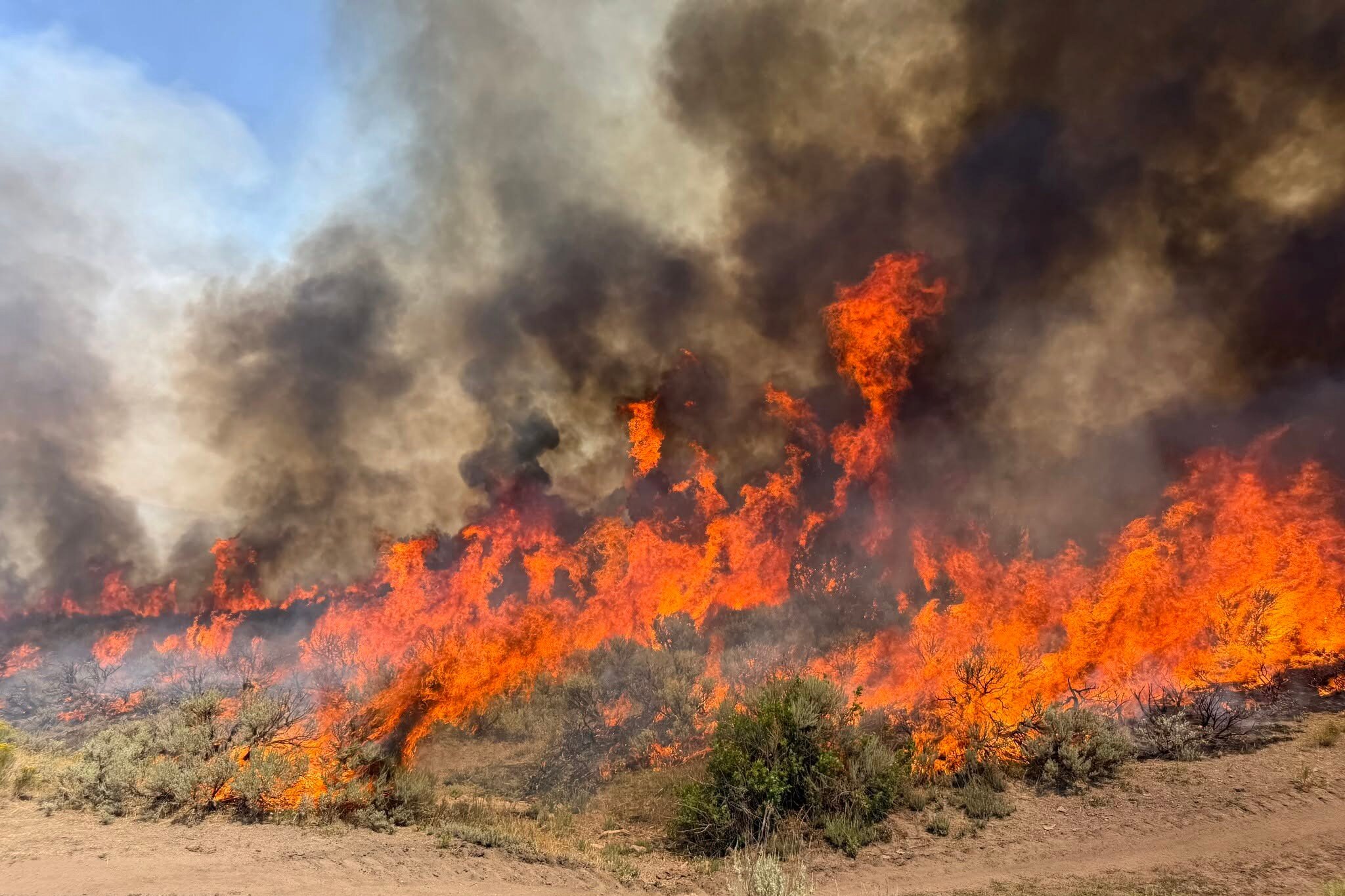 Helicopter crash kills pilot and crew member amid Utah wildfire battle