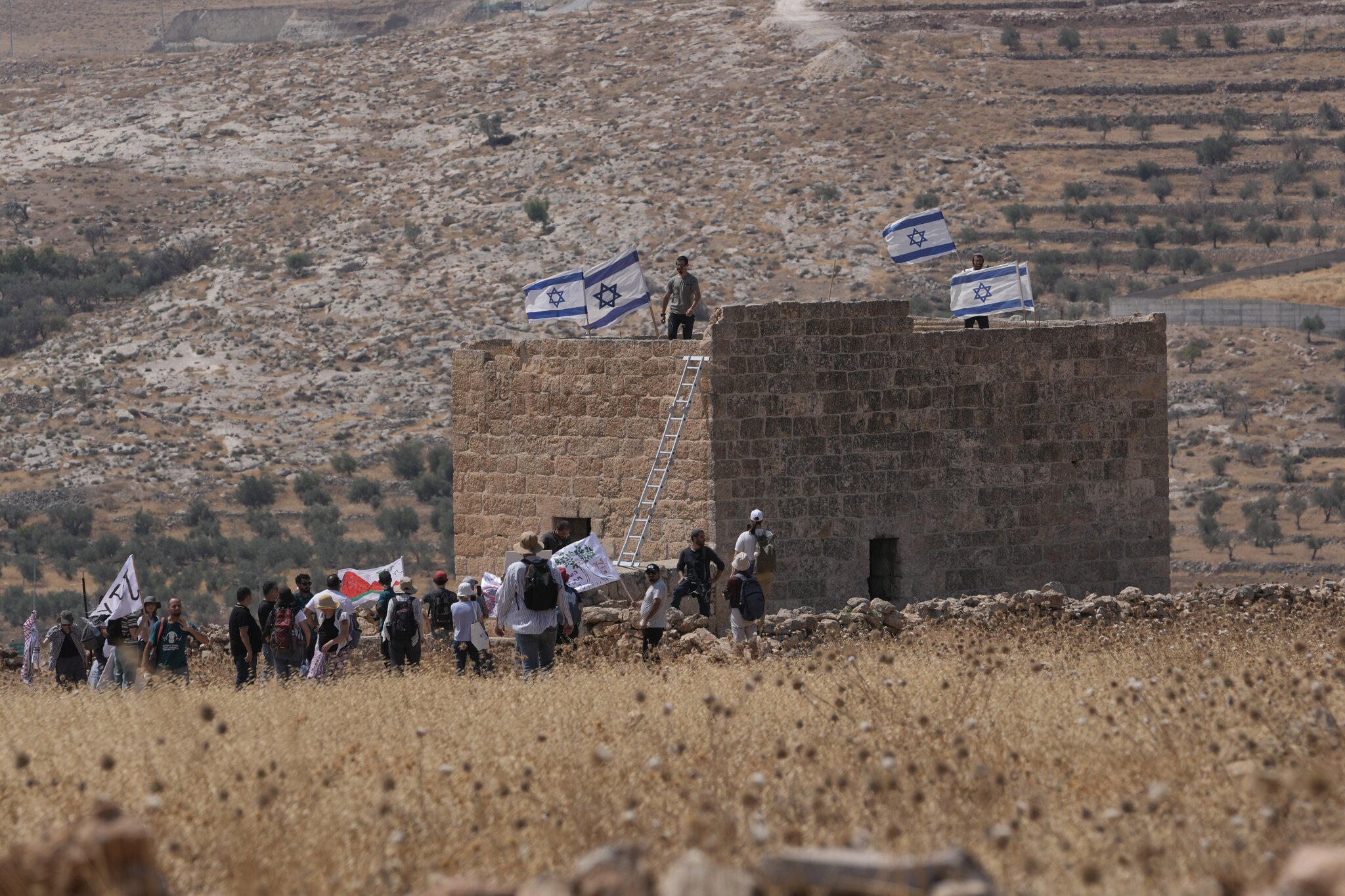 What could stop Israeli settler attacks on Palestinians?