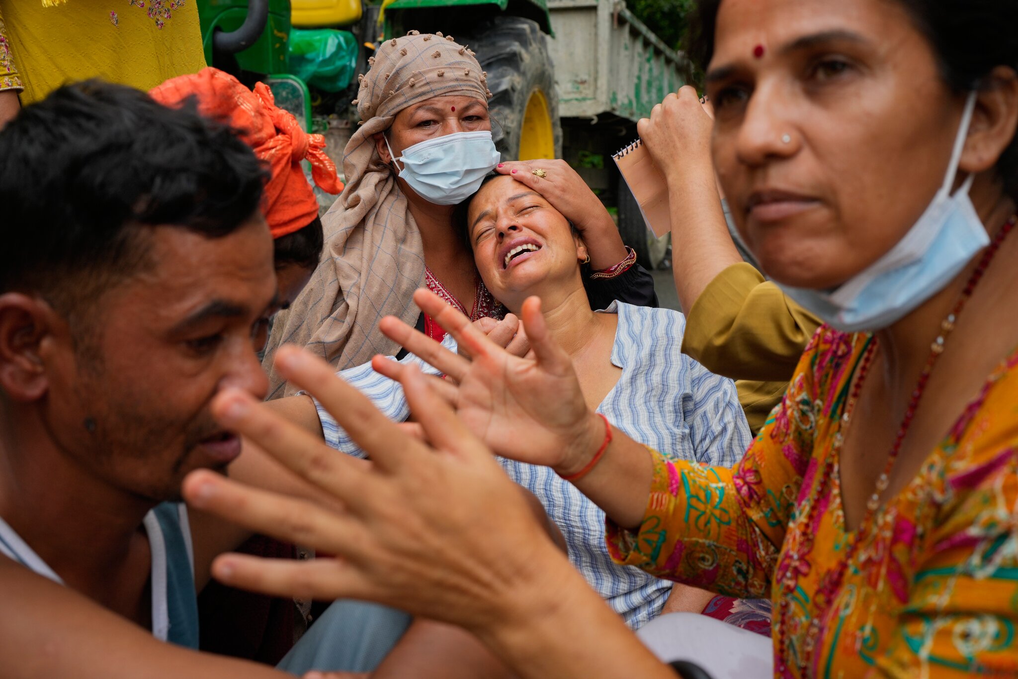 Nepal races to rescue trapped workers, as flood death toll surpasses 900