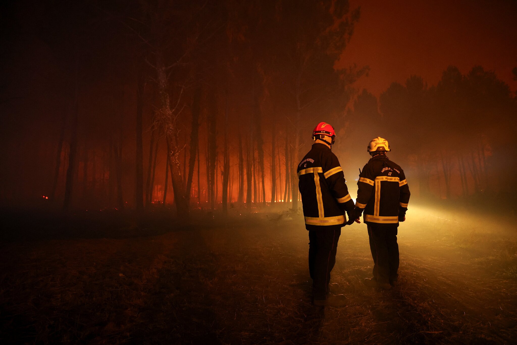 Wildfires force thousands to flee as blazes spread across Europe