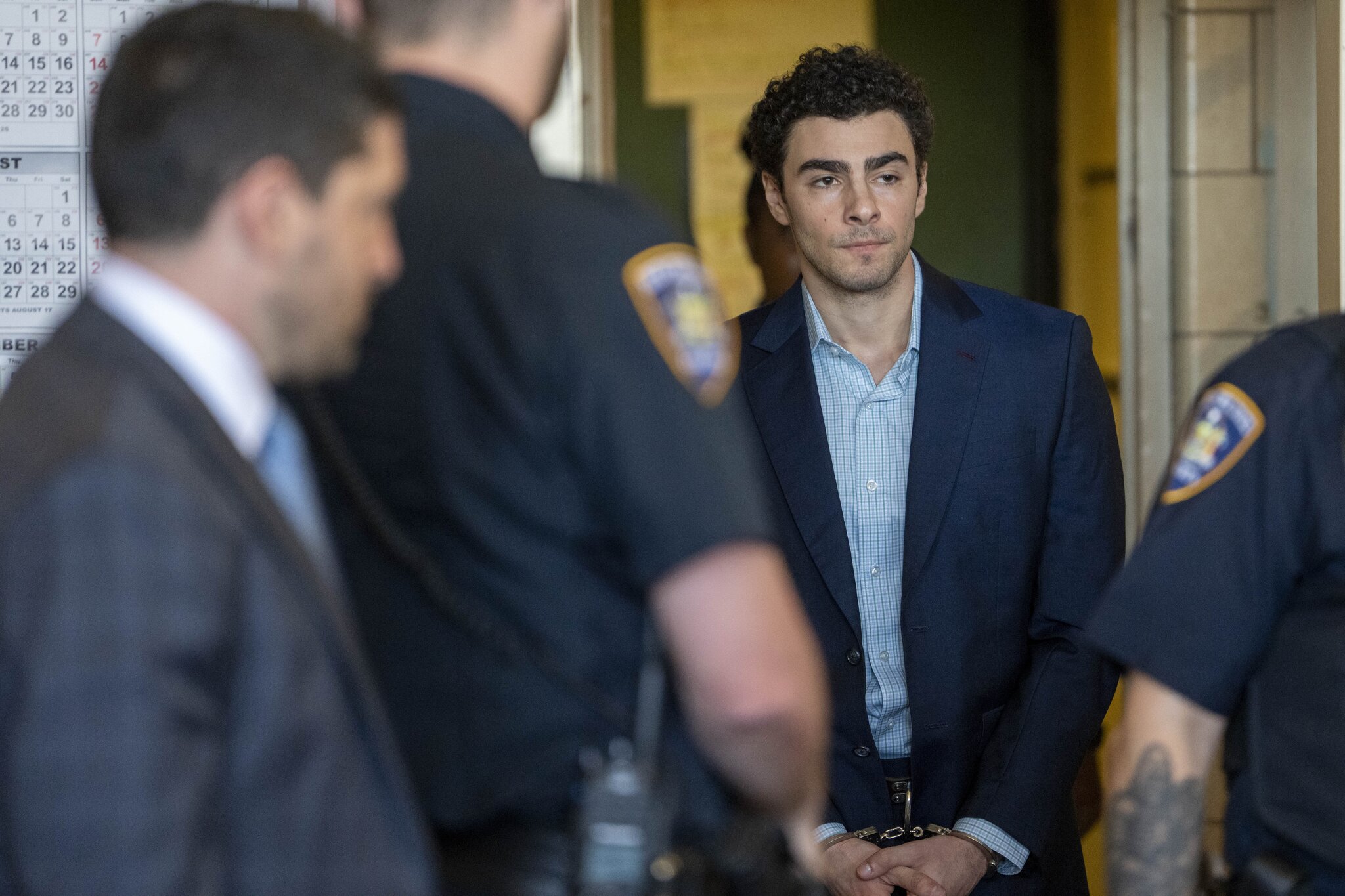 Luigi Mangione pleads guilty to federal stalking charges in the killing of UnitedHealthcare CEO